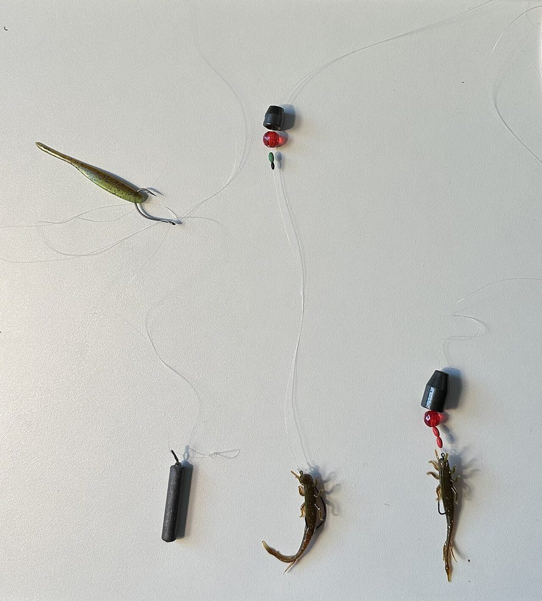 Finesse fishing rigs including a drop shot on clear leader line