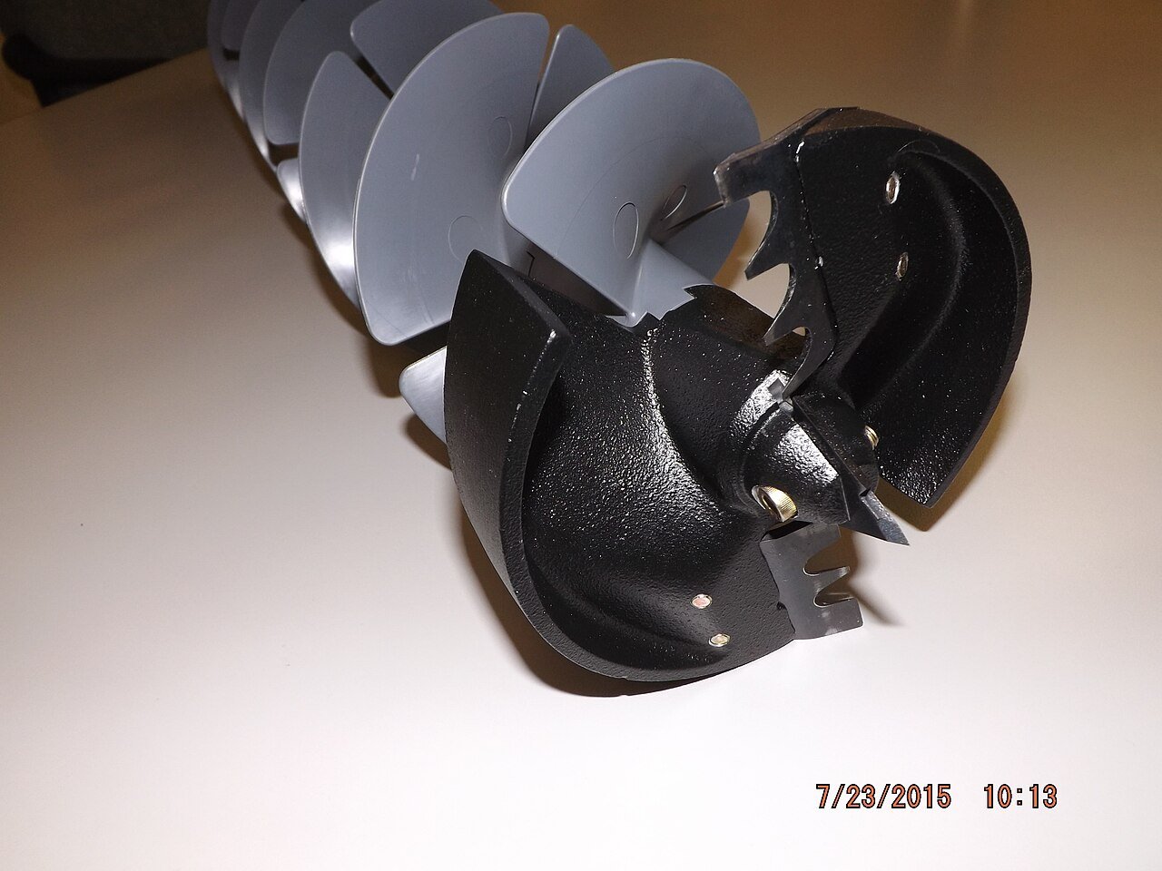 Drill-powered ice auger bit with blades and extension