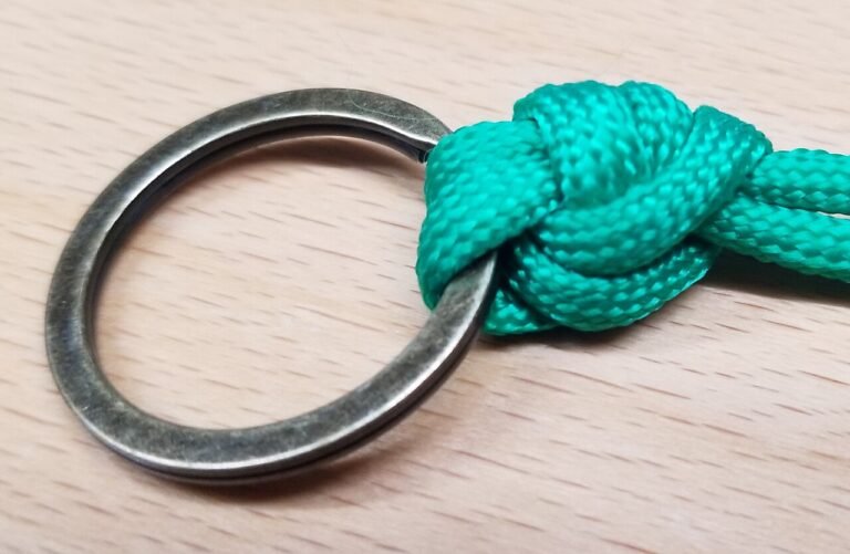 Palomar knot tied to a metal ring, shown in thick cord for clarity
