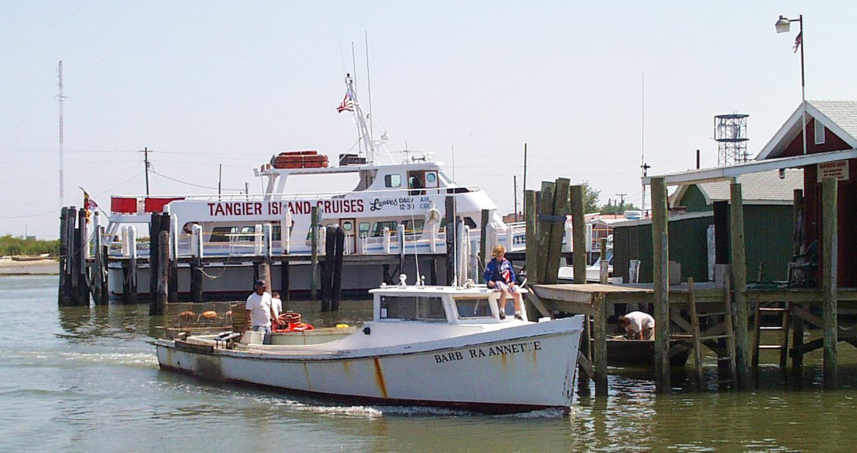 Watermen's workboat returning to the harbor at Tangier Island, Virginia